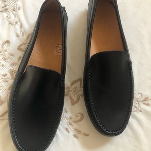 Todd’s black leather Mocs